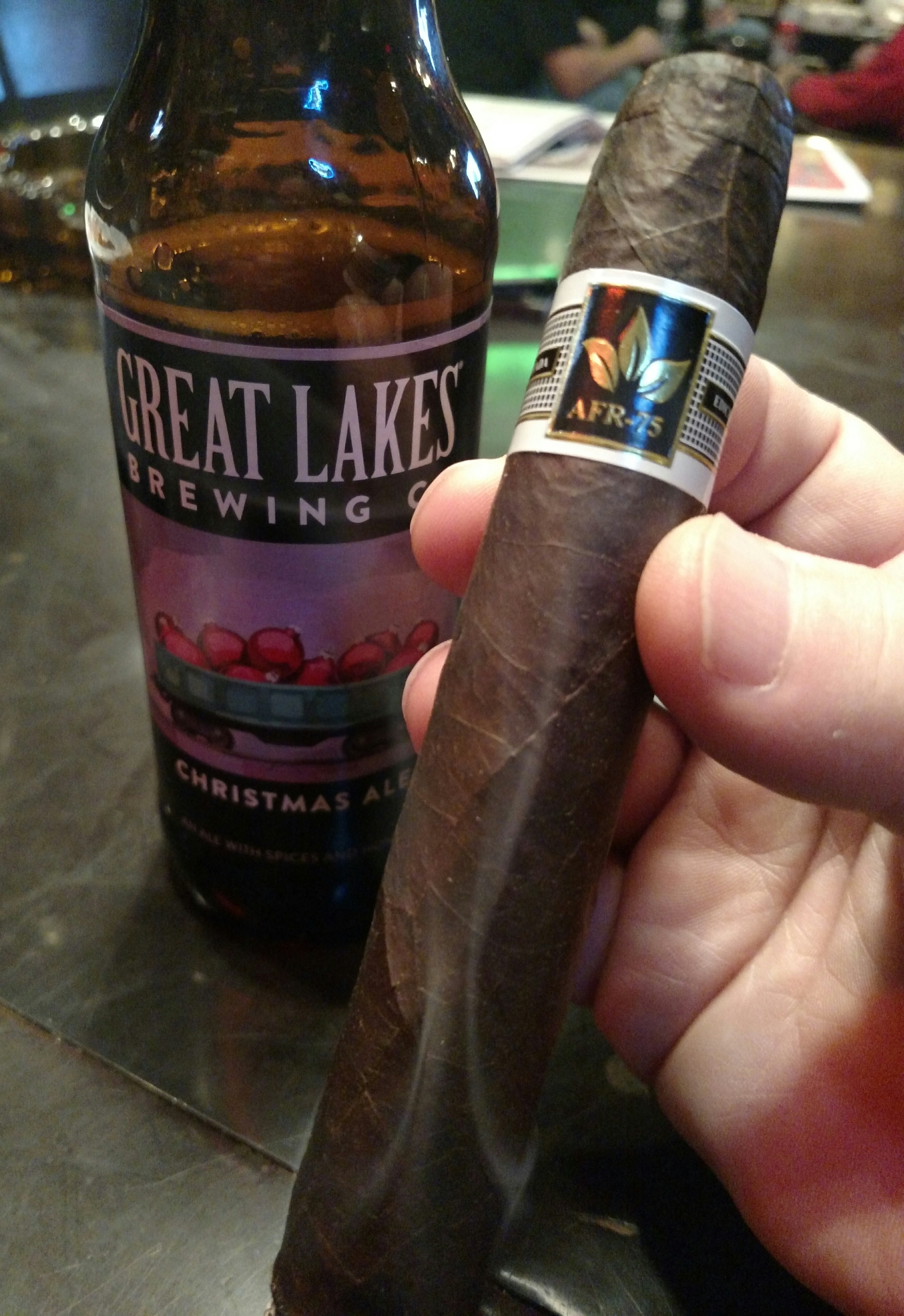 Enjoying an AFR-75 with a Great Lakes Christmas Ale at The Cigar Affair